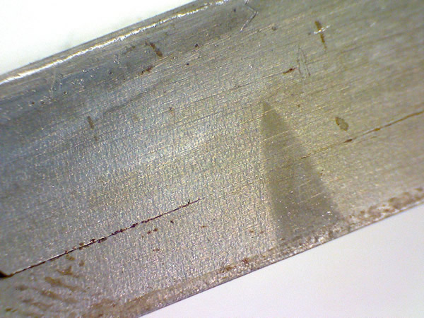 Overlap welding between two longitudinal pieces